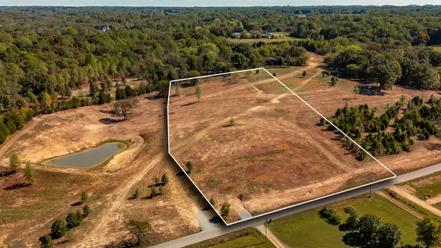 an outdoor space with wooden floor