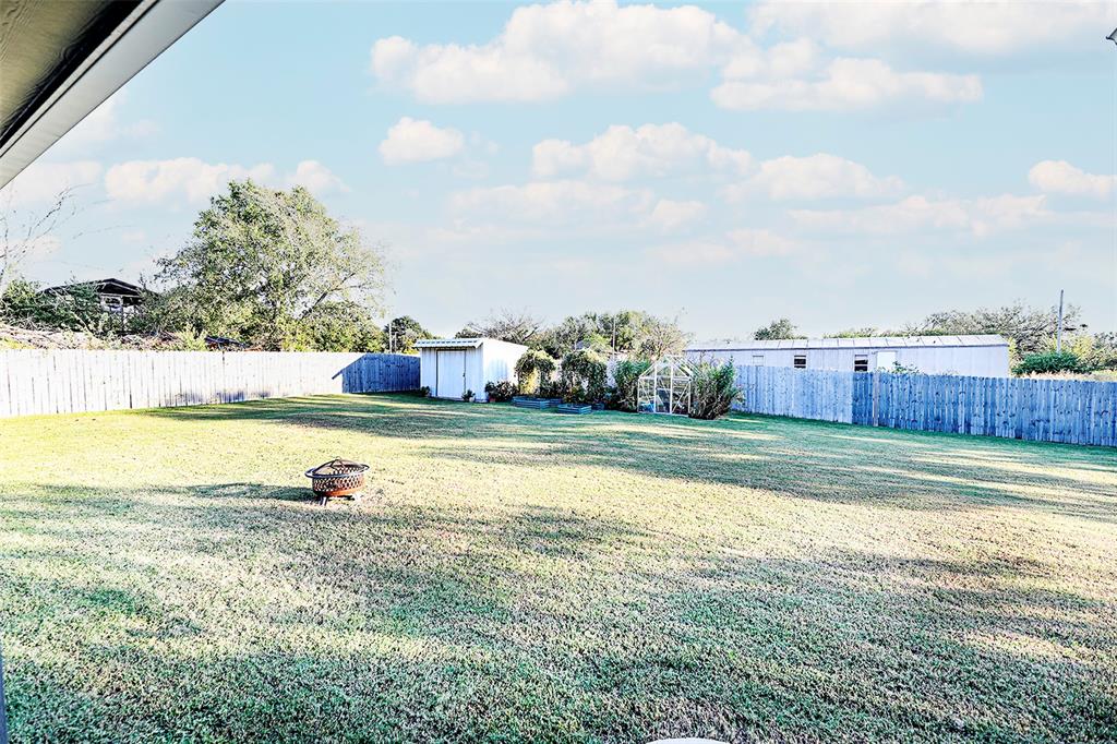 305 Main Street Nocona, TX 76255 - Photo 21 of 36 a view of a swimming pool and an outdoor seating