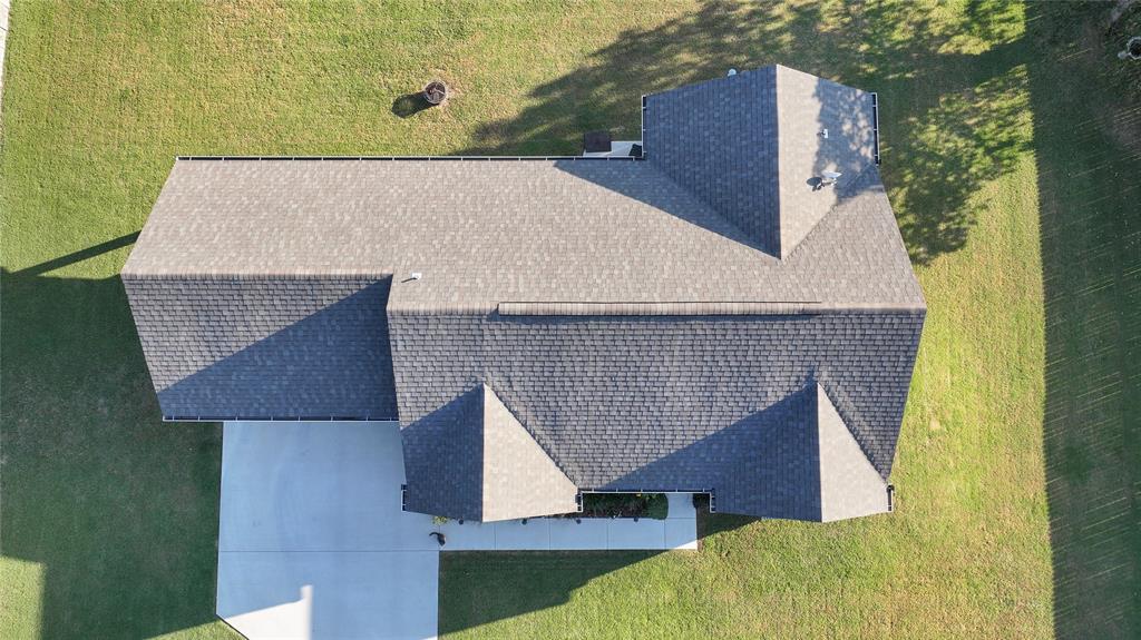 305 Main Street Nocona, TX 76255 - Photo 36 of 36 an aerial view of a house with a yard