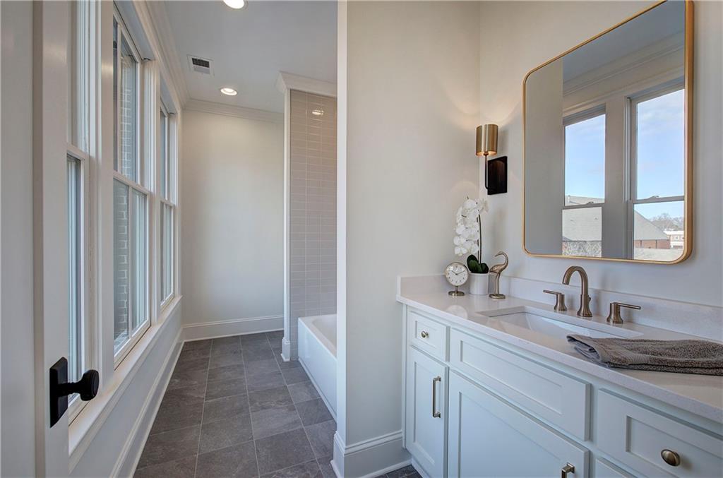 178 West Main Street, Unit 102 Cartersville, GA 30120 - Photo 34 of 50 a bathroom with a sink and a mirror