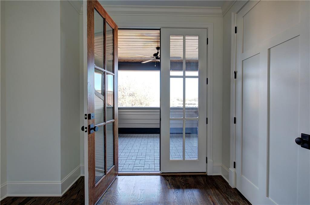 178 West Main Street, Unit 102 Cartersville, GA 30120 - Photo 37 of 50 a view of a hallway with wooden floor and a bathroom