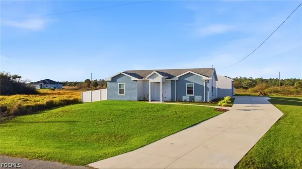 a house view with a garden space