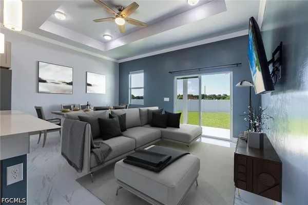 a living room with furniture and a floor to ceiling window