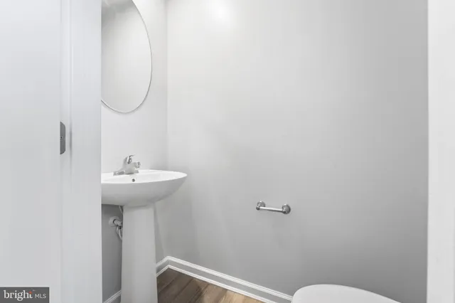 a bathroom with a sink and toilet