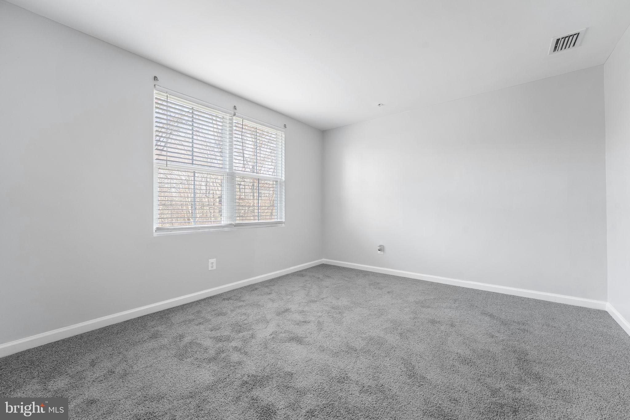 152 Ben Boulevard Elkton, MD 21921 - Photo 13 of 34 an empty room with windows