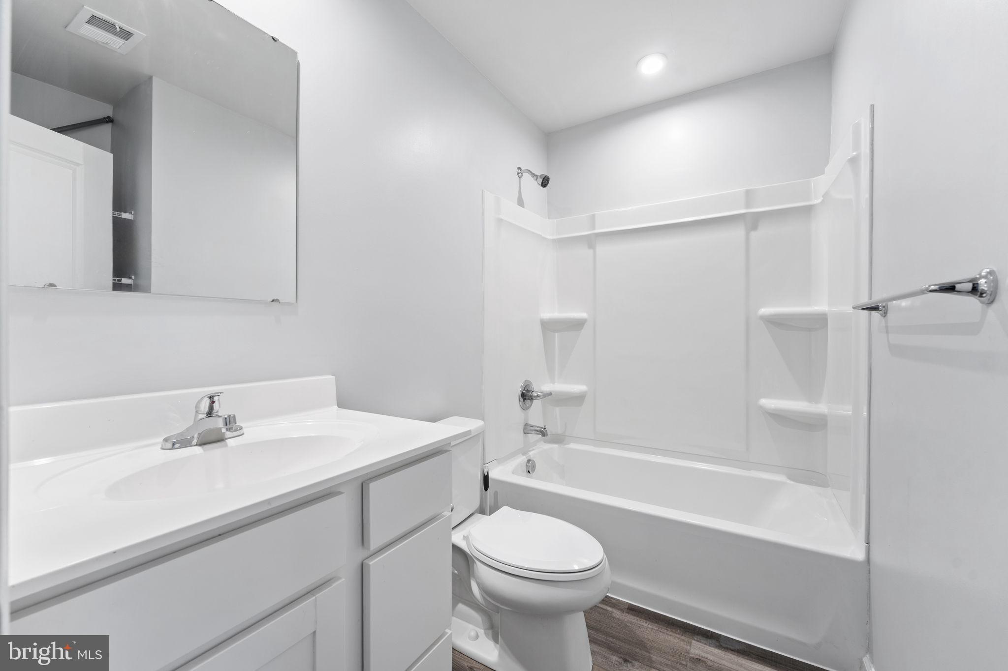 152 Ben Boulevard Elkton, MD 21921 - Photo 22 of 34 a bathroom with a sink mirror toilet and bathtub