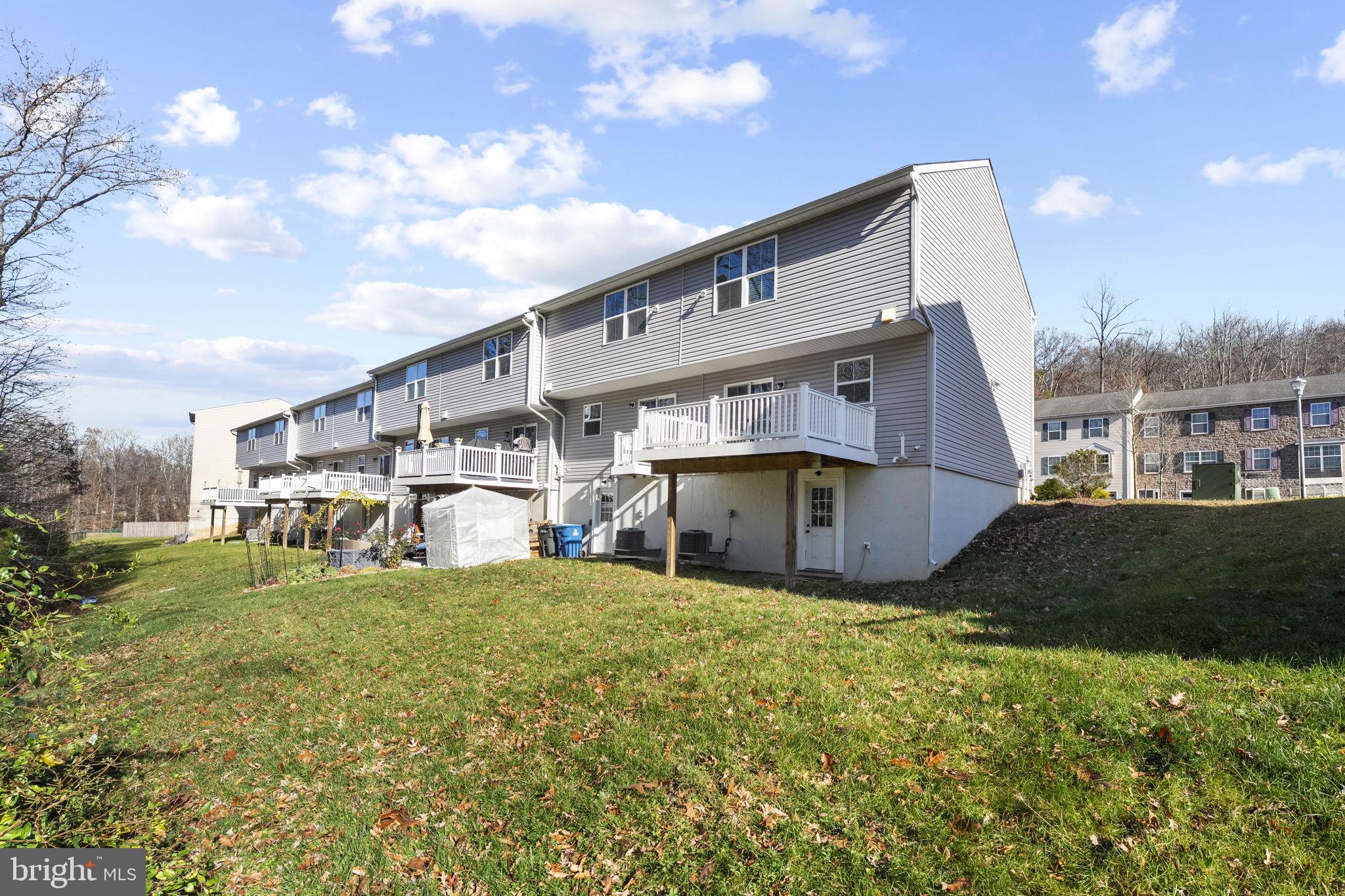 152 Ben Boulevard Elkton, MD 21921 - Photo 30 of 34 a view of a house with a yard and sitting area