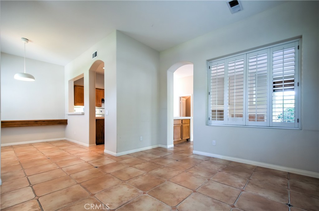 2 Altezza Irvine, CA 92606 - Photo 14 of 66 a view of a kitchen with furniture and an empty room