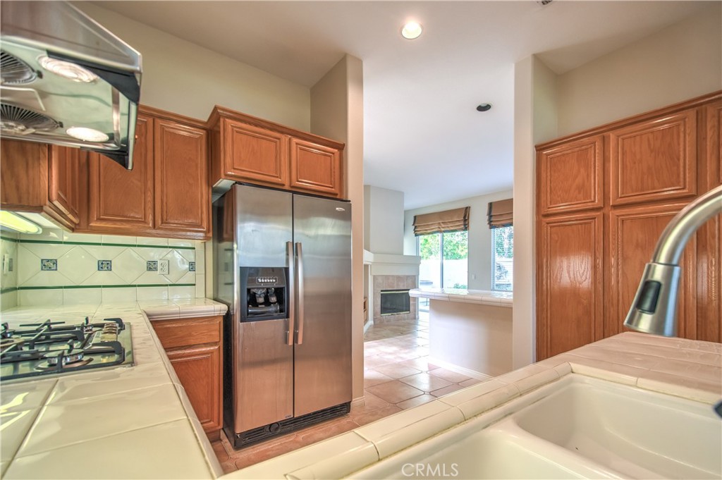 2 Altezza Irvine, CA 92606 - Photo 21 of 66 a kitchen with stainless steel appliances granite countertop a refrigerator and a stove