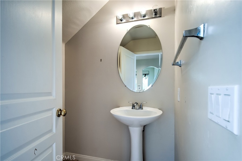 2 Altezza Irvine, CA 92606 - Photo 27 of 66 a bathroom with a sink and a mirror
