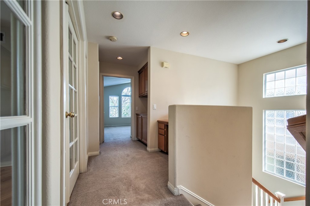 2 Altezza Irvine, CA 92606 - Photo 30 of 66 a view of a hallway with furniture and windows