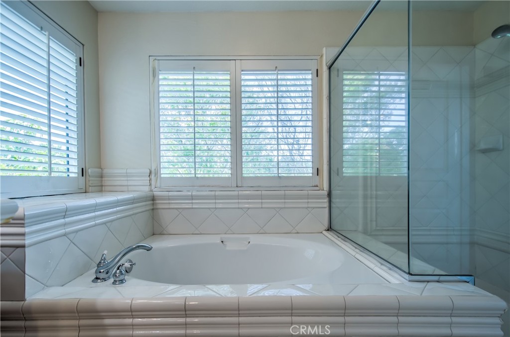 2 Altezza Irvine, CA 92606 - Photo 44 of 66 a bathroom with a bathtub and window