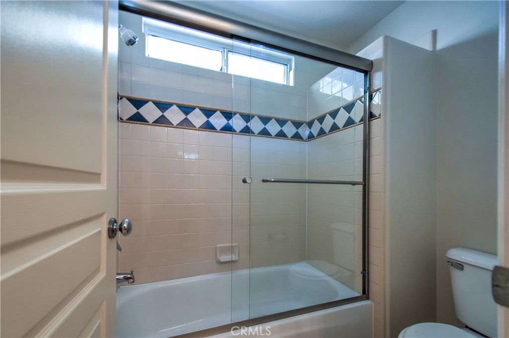 2 Altezza Irvine, CA 92606 - Photo 57 of 66 a bathroom with a shower and a toilet