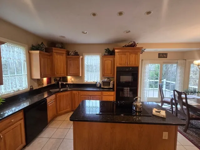 a kitchen with counter top space cabinets and a sink