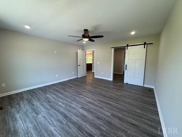 2274 Spg Grv Road Spout Spring, VA 24593 - Photo 5 of 21 an empty room with wooden floor and ceiling fan