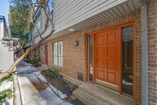 a front view of a house with a garage
