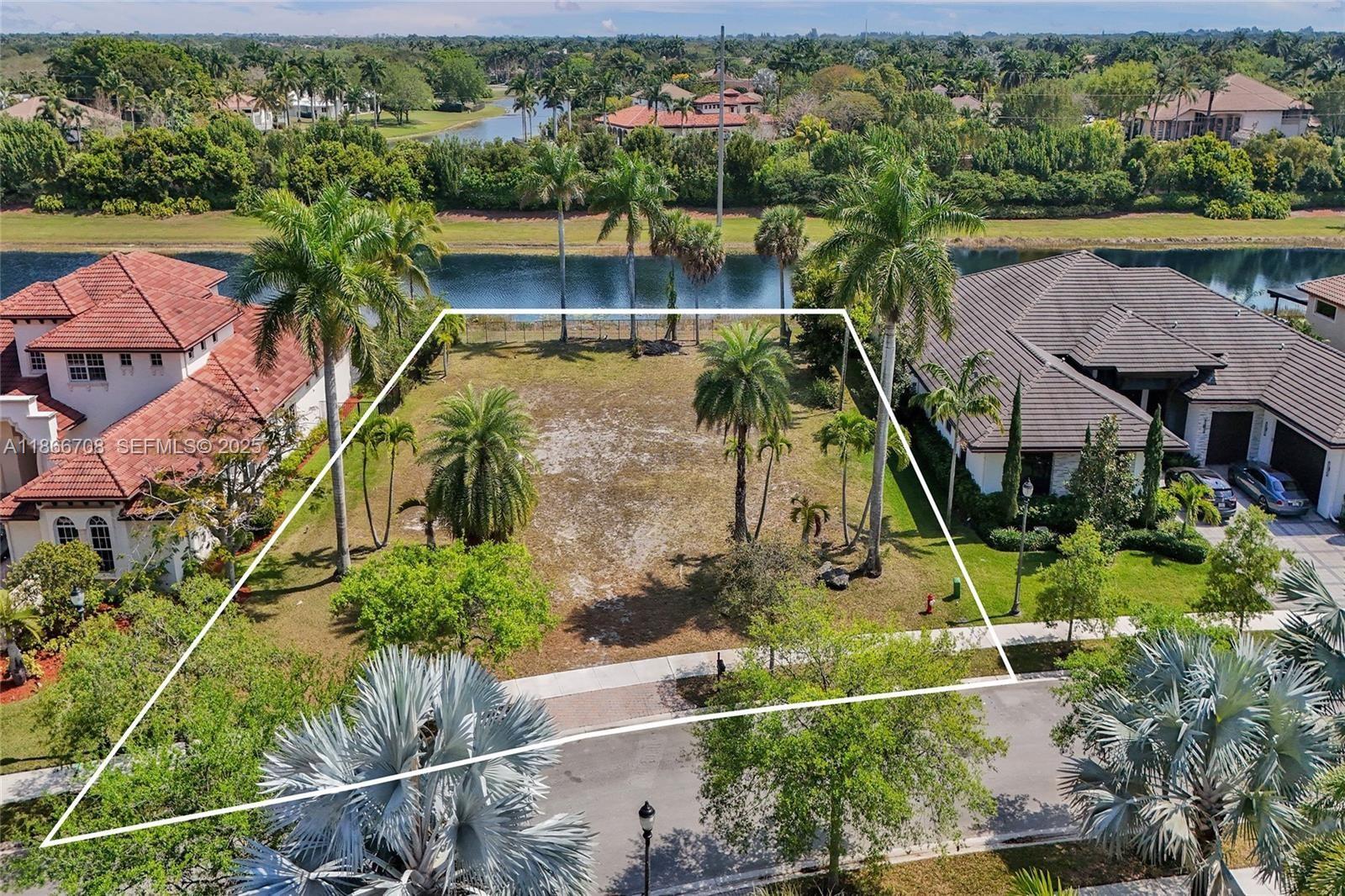 an aerial view of houses with yard