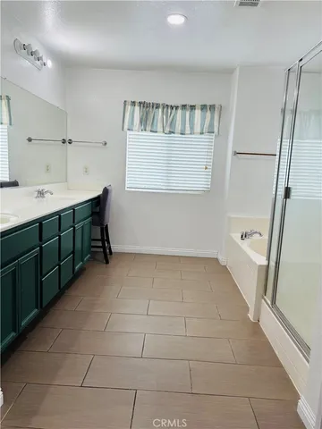 a view of kitchen with furniture and window
