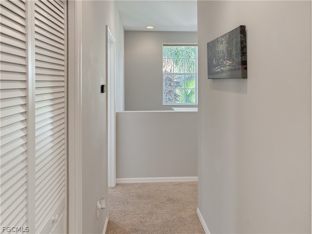 3269 Amanda Lane, Unit 2 Naples, FL 34109 - Photo 25 of 38 a view of an empty room with a window