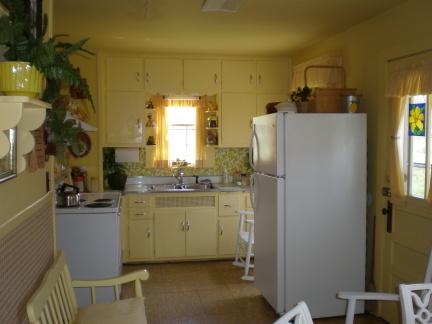 3275 Conner Grove Road Southwest Willis, VA 24380 - Photo 16 of 17 a kitchen with a refrigerator and a sink