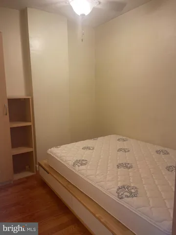 a close up of a bed in a room