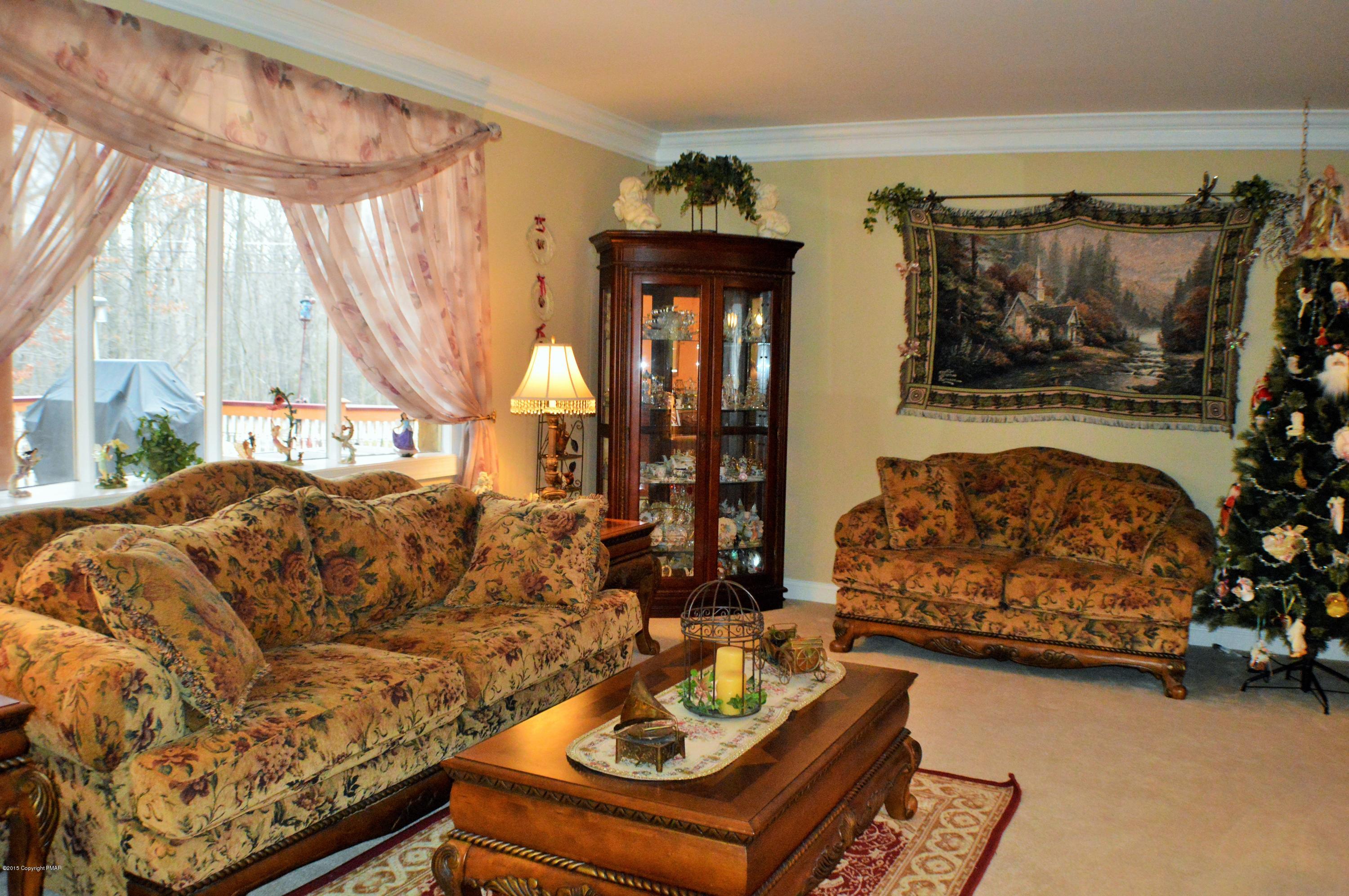2105 Laurel Ridge Road East Stroudsburg, PA 18302 - Photo 22 of 82 a living room with furniture and a window