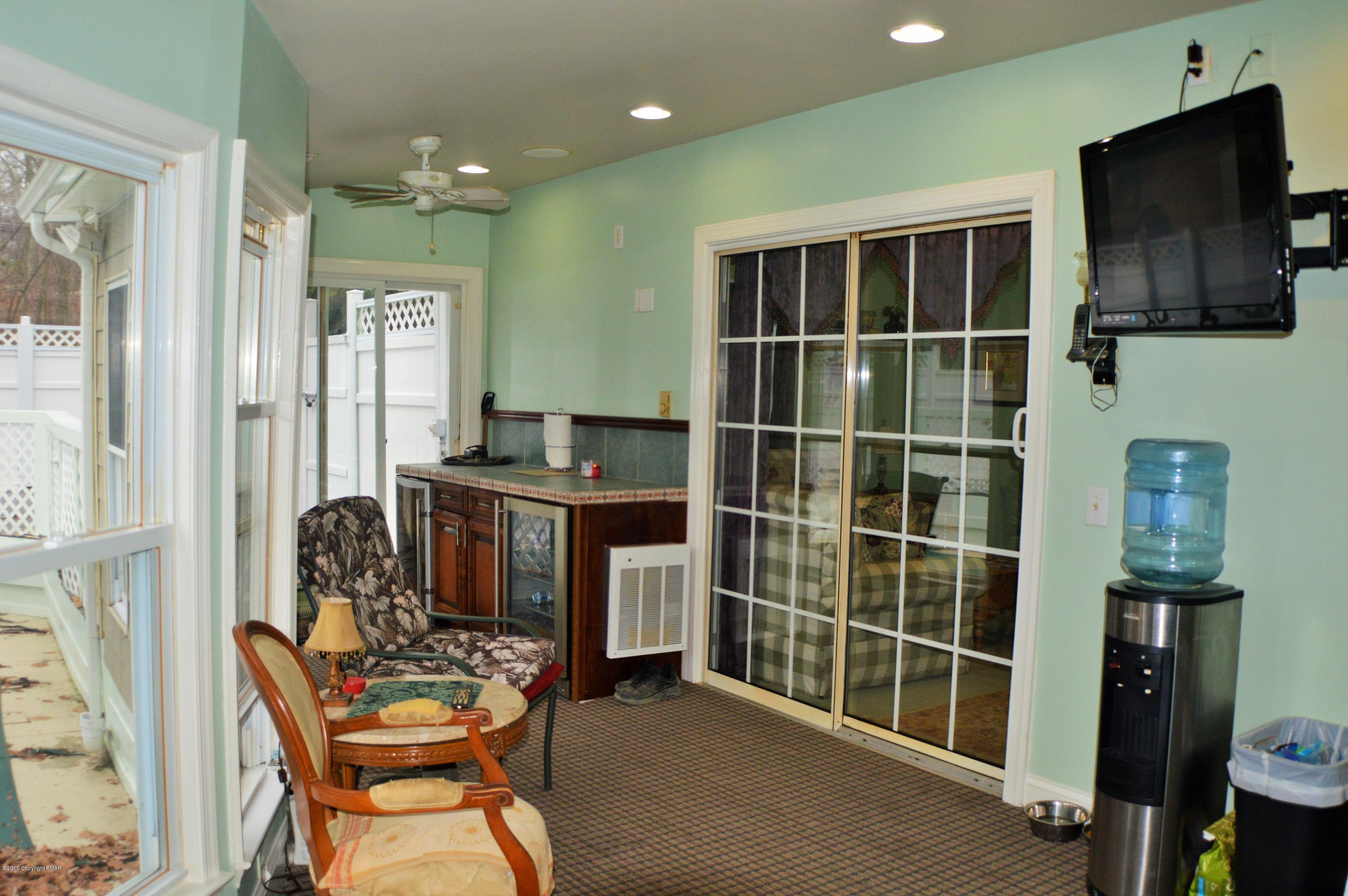 2105 Laurel Ridge Road East Stroudsburg, PA 18302 - Photo 33 of 82 a workspace with furniture and a flat screen tv