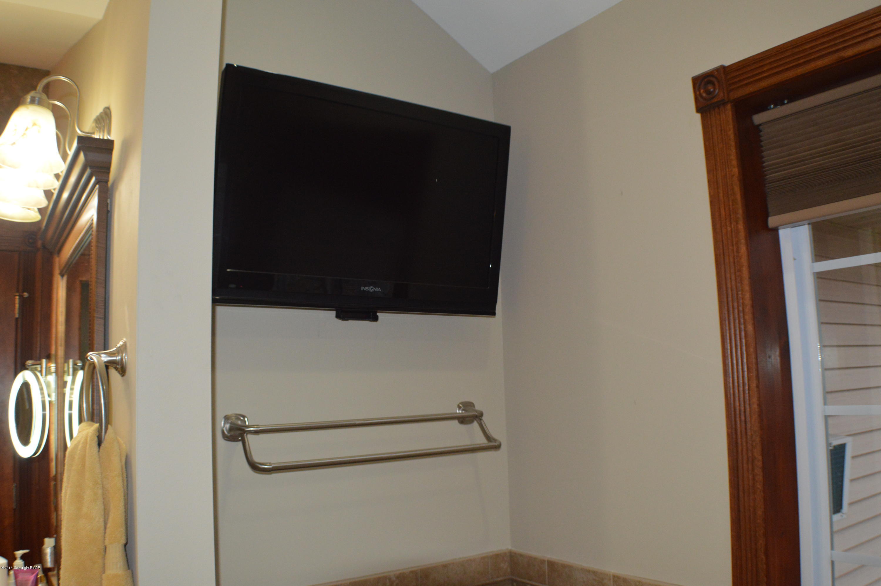 2105 Laurel Ridge Road East Stroudsburg, PA 18302 - Photo 47 of 82 a bathroom with a shower and a mirror
