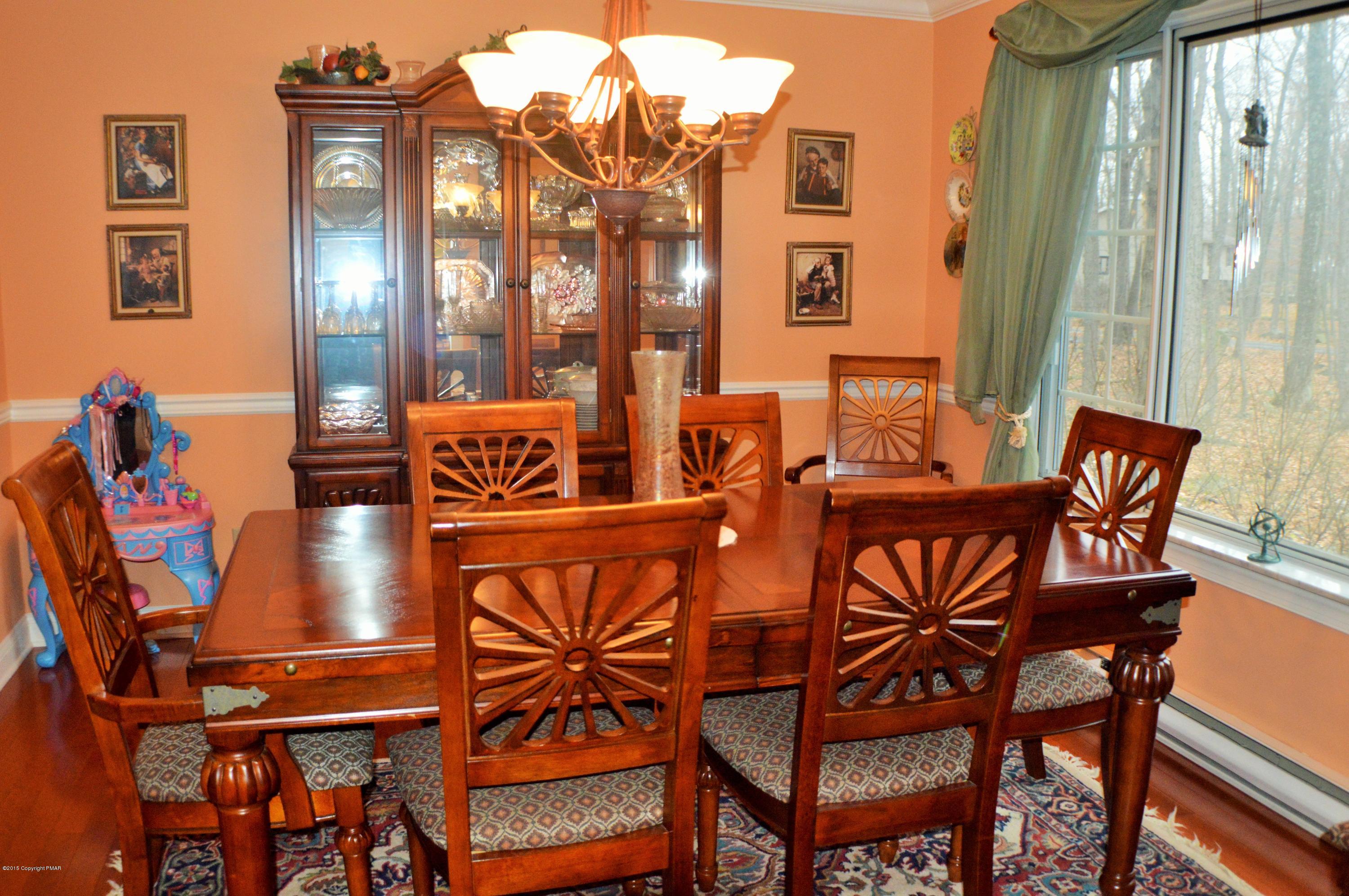 2105 Laurel Ridge Road East Stroudsburg, PA 18302 - Photo 7 of 82 a view of an chairs and tables in the balcony