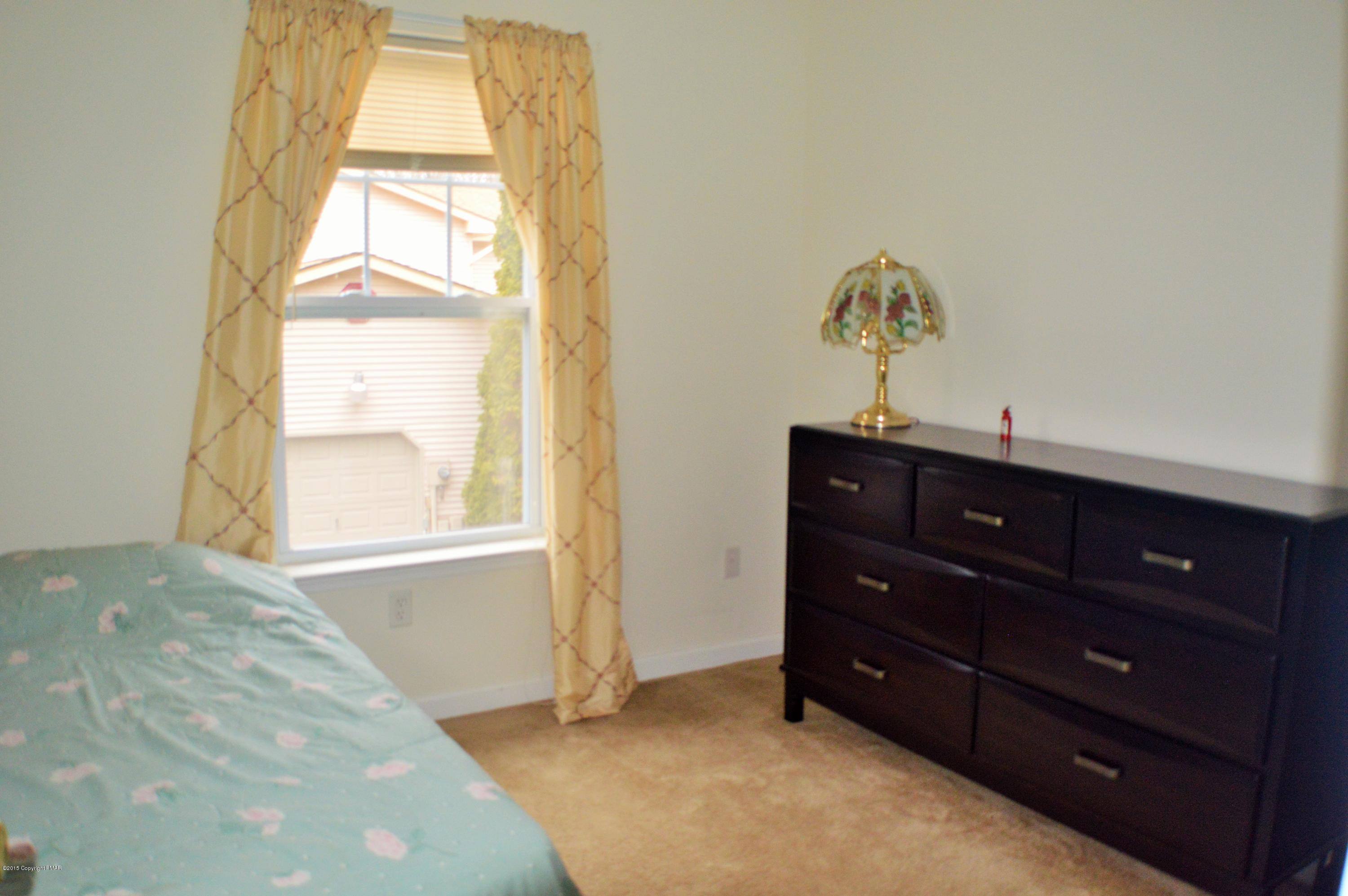 2105 Laurel Ridge Road East Stroudsburg, PA 18302 - Photo 82 of 82 a room with a dresser and a window