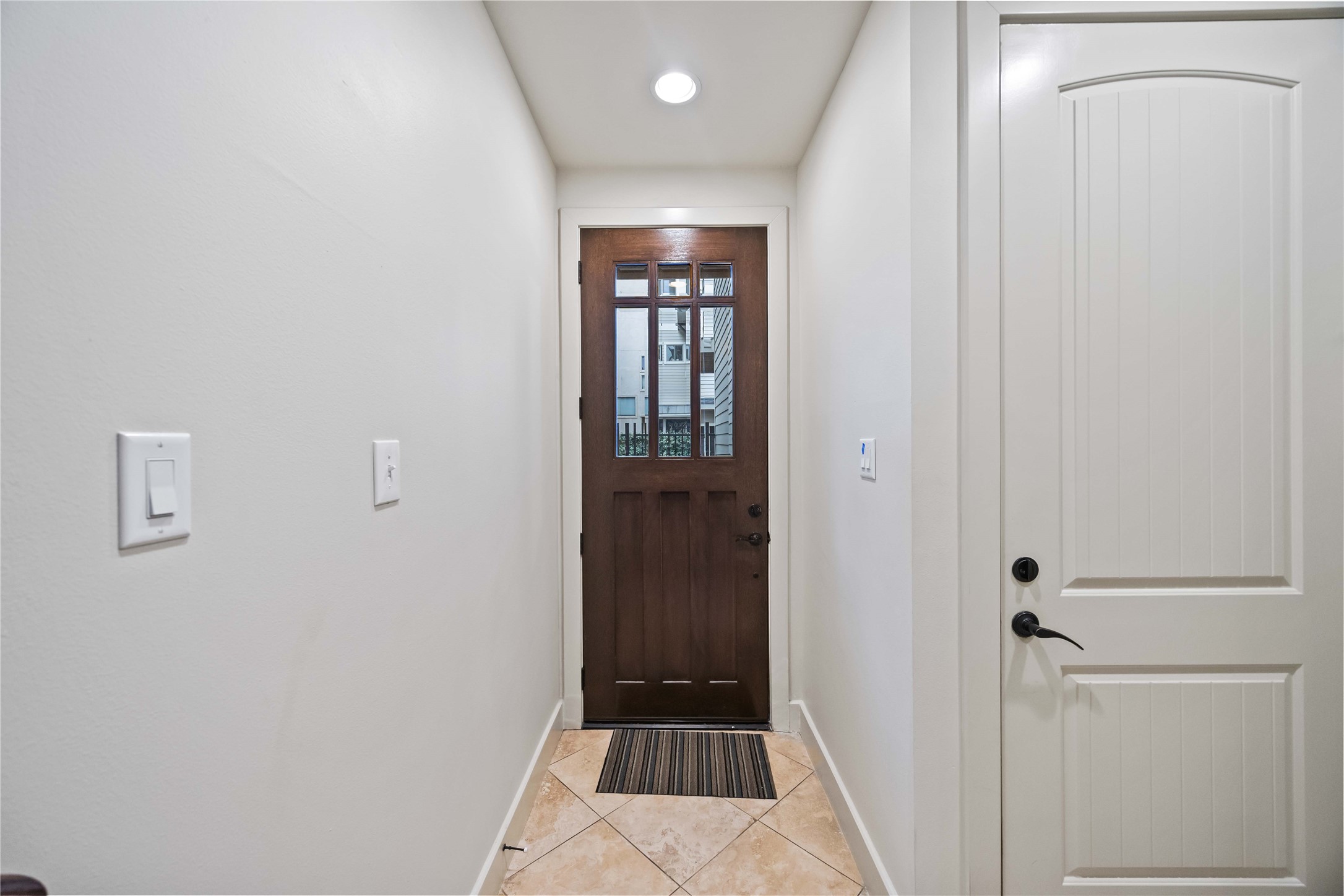 2435 Charleston Street, Unit C Houston, TX 77021 - Photo 5 of 44 First Floor Entry/Garage Entry Door