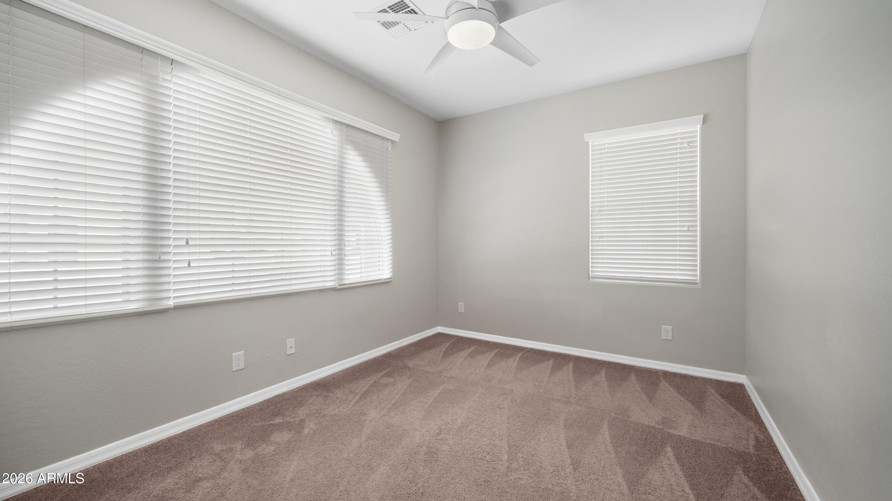 16159 West Granada Road Goodyear, AZ 85395 - Photo 33 of 41 a view of an empty room with a window