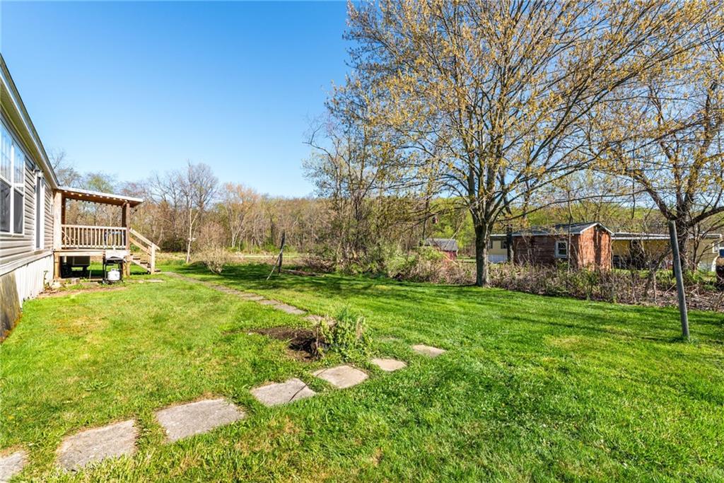 176 Seger Road Derry, PA 15627 - Photo 26 of 41 a backyard of a house with lots of green space