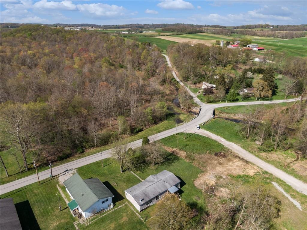 176 Seger Road Derry, PA 15627 - Photo 30 of 41 an aerial view of a house with a yard