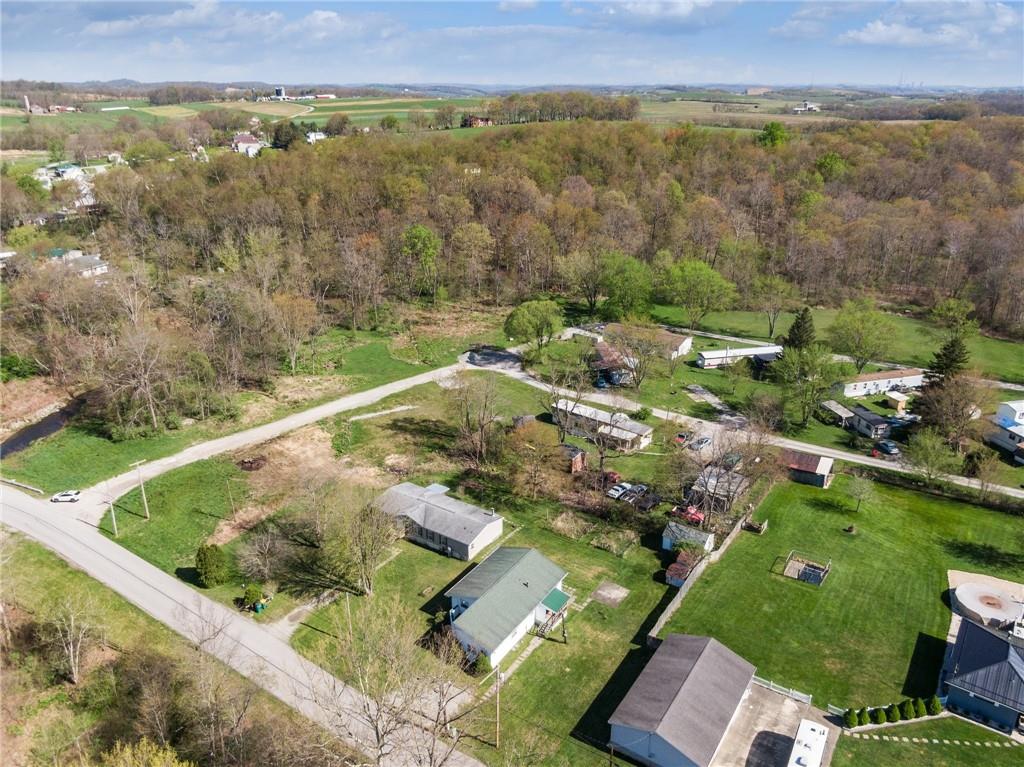 176 Seger Road Derry, PA 15627 - Photo 3 of 41 an aerial view of a house with a yard