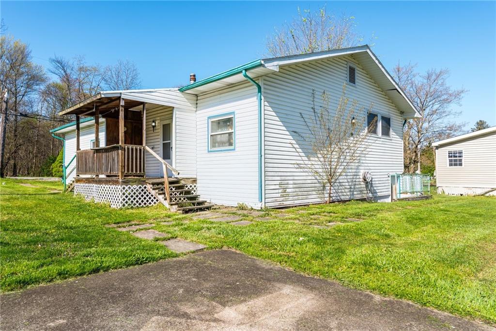 176 Seger Road Derry, PA 15627 - Photo 33 of 41 a front view of a house with a yard