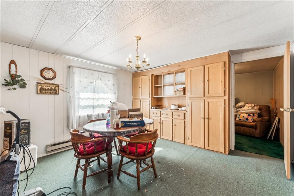 176 Seger Road Derry, PA 15627 - Photo 36 of 41 a dining room with furniture and window