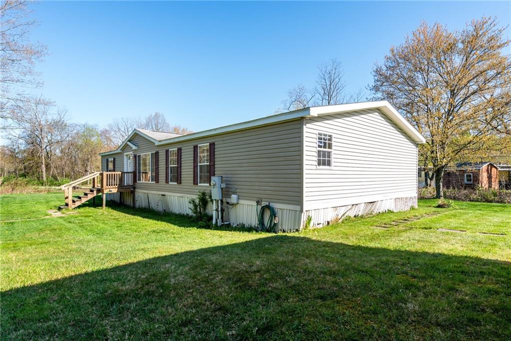 176 Seger Road Derry, PA 15627 - Photo 4 of 41 a front view of house with yard and green space
