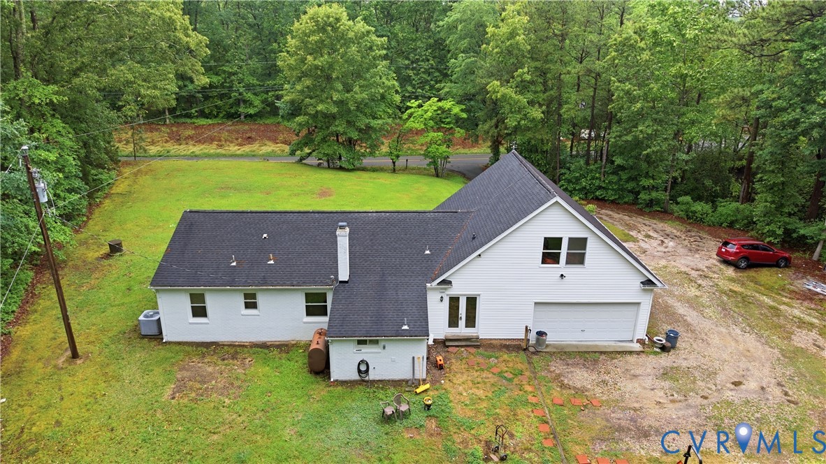 10152 Georgetown Road Mechanicsville, VA 23116 - Photo 31 of 35 a view of a house with a yard