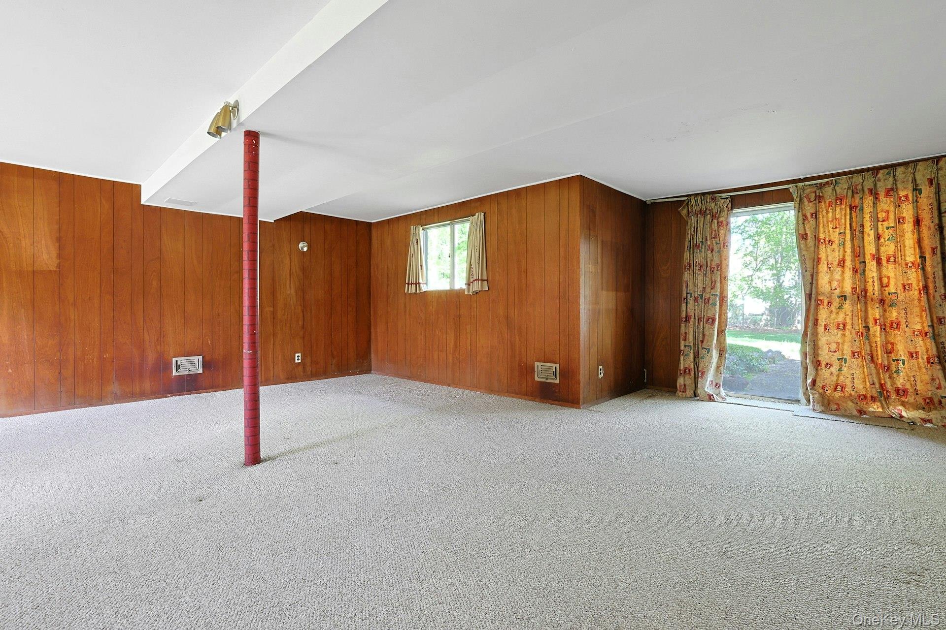44 Southgate Drive Spring Valley, NY 10977 - Photo 19 of 24 a view of empty room with floor to ceiling window