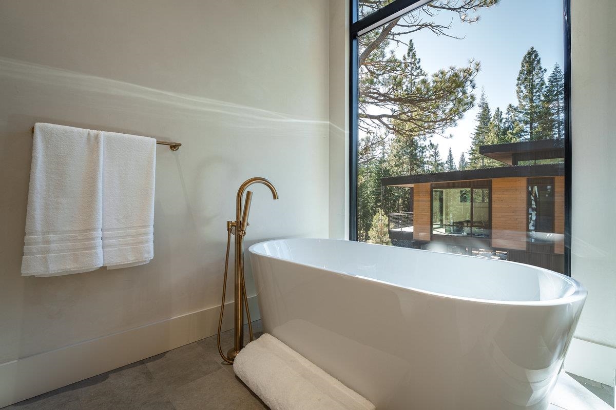 9308 Nine Bark Road Truckee, CA 96161 - Photo 16 of 28 a living room with a large window and furniture