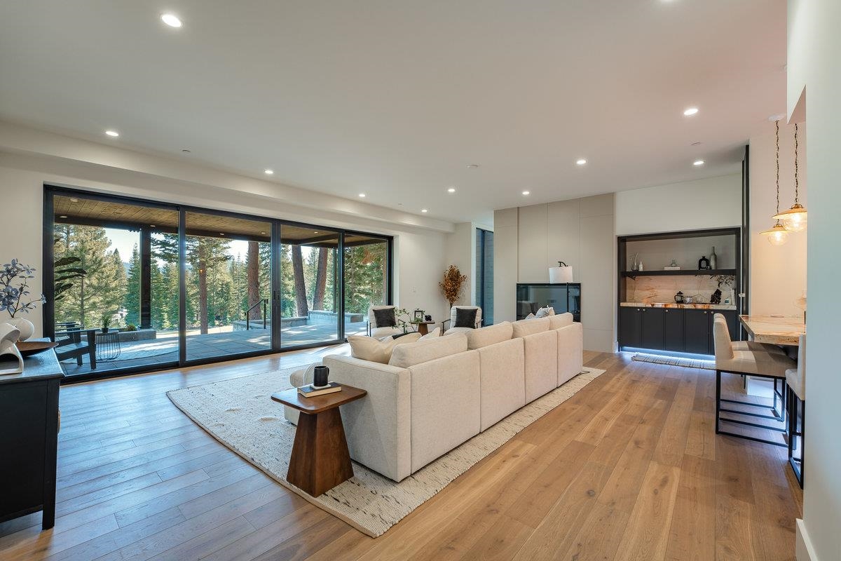 9308 Nine Bark Road Truckee, CA 96161 - Photo 19 of 28 a living room with furniture and a large window