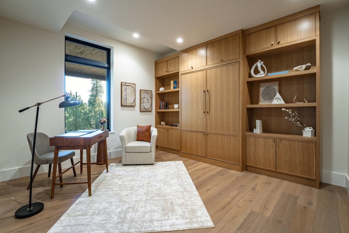 9308 Nine Bark Road Truckee, CA 96161 - Photo 24 of 28 a living room with furniture a rug and a window