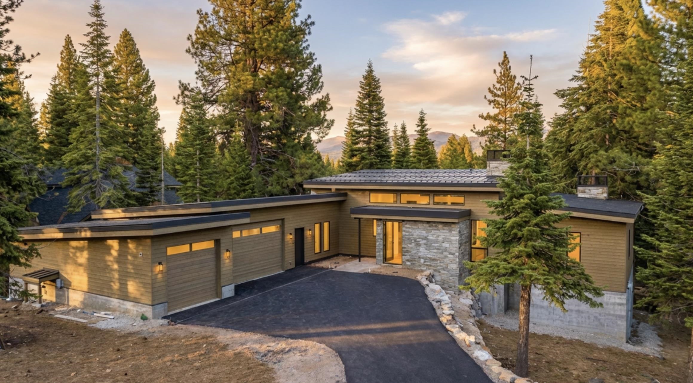 9308 Nine Bark Road Truckee, CA 96161 - Photo 26 of 28 a front view of a house with trees