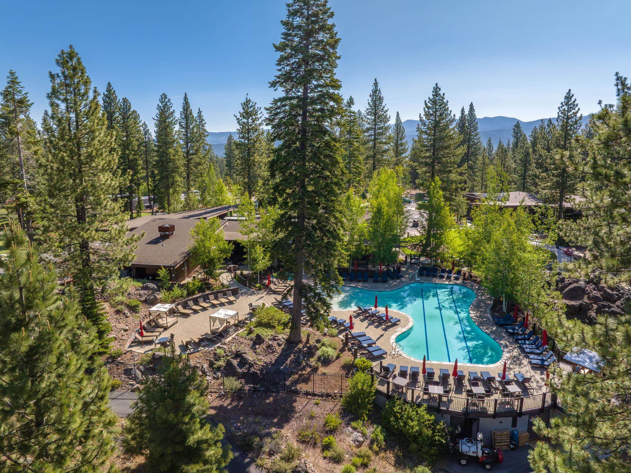 9308 Nine Bark Road Truckee, CA 96161 - Photo 28 of 28 a view of a lake with a building in the background