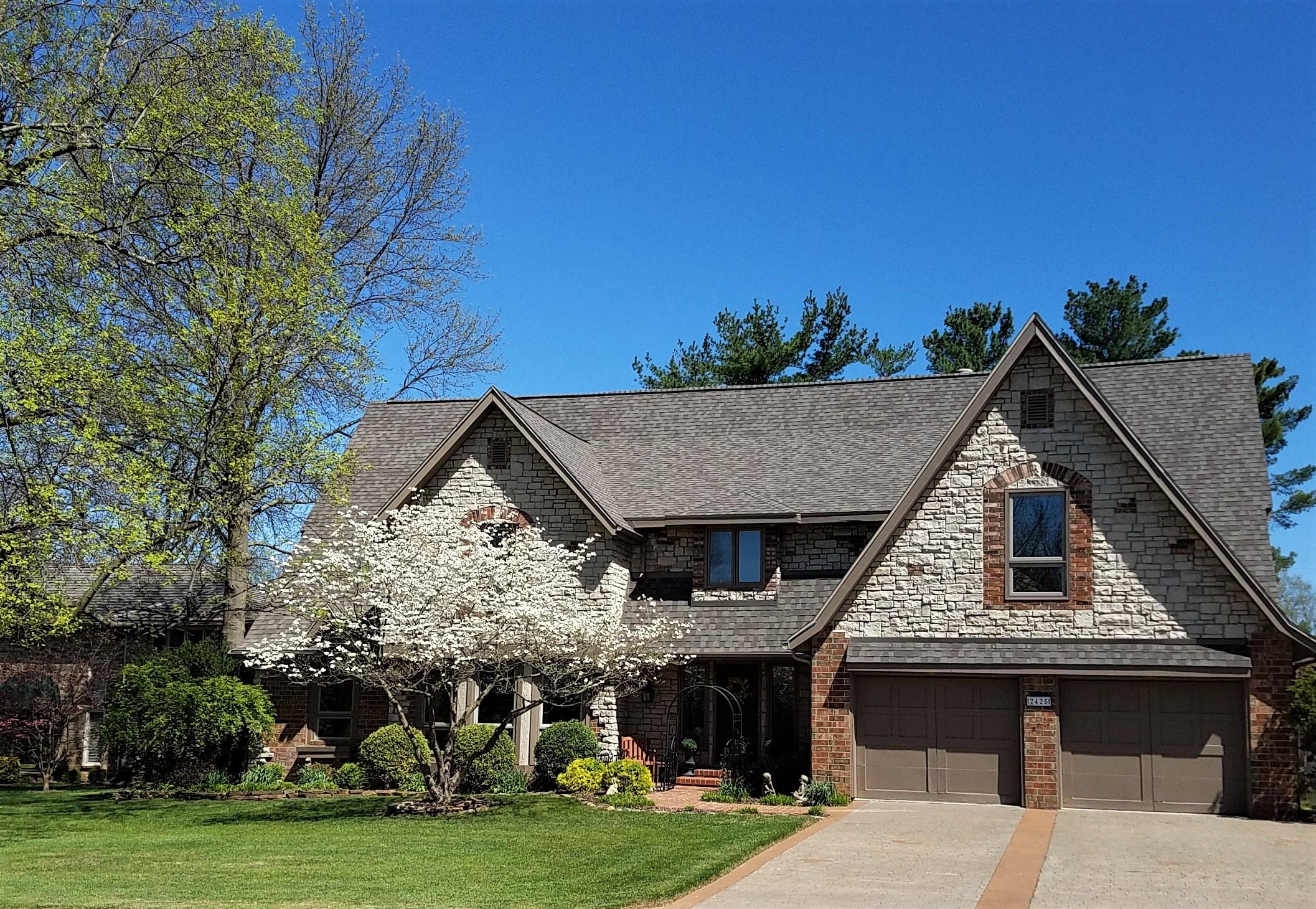 2425 East Raynell Street Springfield, MO 65804 - Photo 1 of 1 front of house in spring enahanced