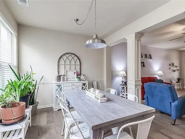 a view of a dining room with furniture
