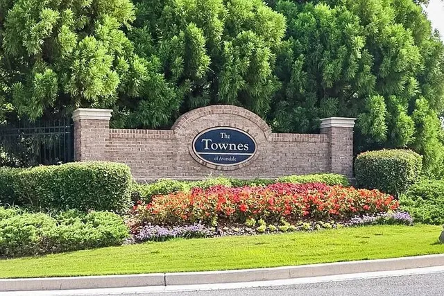 a sign on the side of the road