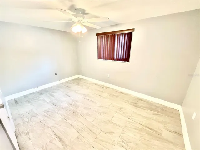 a view of empty room with window