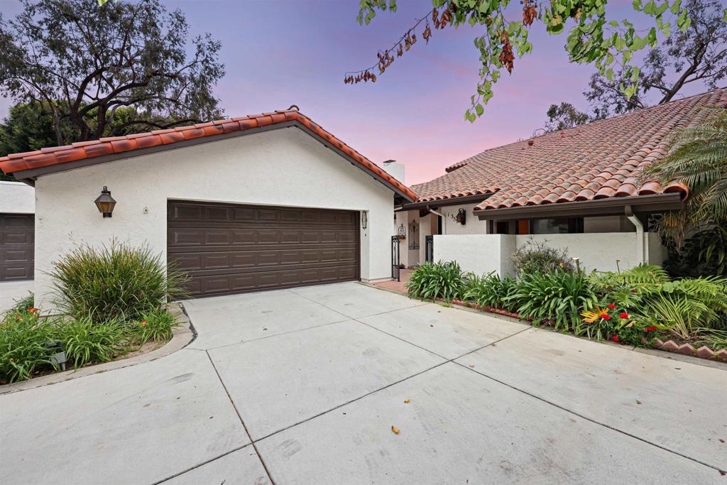 1359 Sun Valley Road Solana Beach, CA 92075 - Photo 1 of 1 a front view of a house with garden